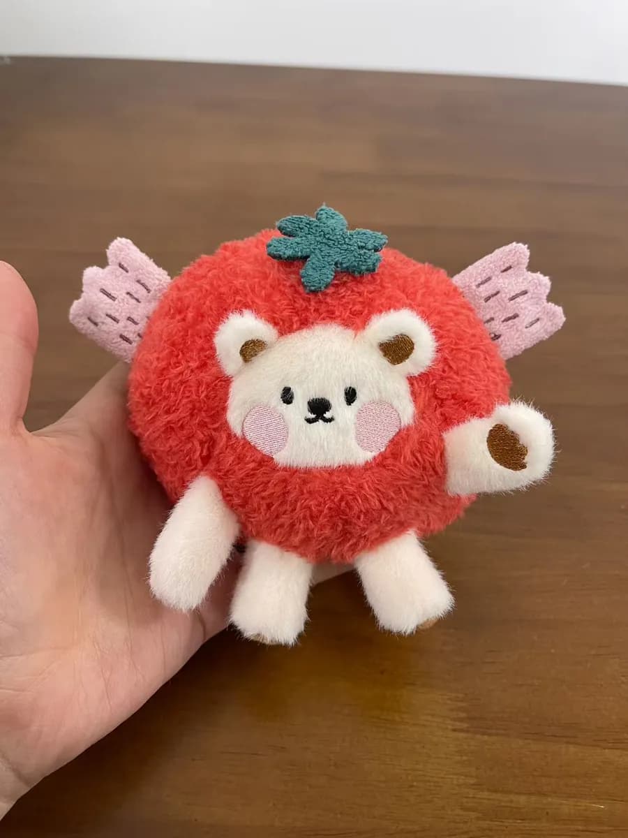 Strawberry bear plush charm in red fluffy fabric