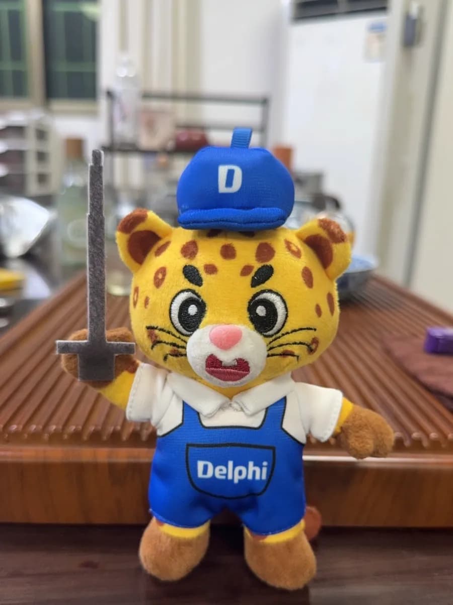 Corporate leopard mascot plush toy in a branded jersey and cap